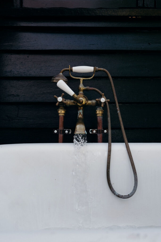 Vintage brass tapware for outdoor bath tub. Bunnyconnellen Winter Accommodation